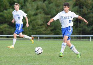 Cross playing defense in Varsity Boys soccer (PC Mark Bushnell) 