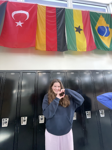 Aurelia Torres Bauer, in front of German flag in U-32 (Pearl Jackes)